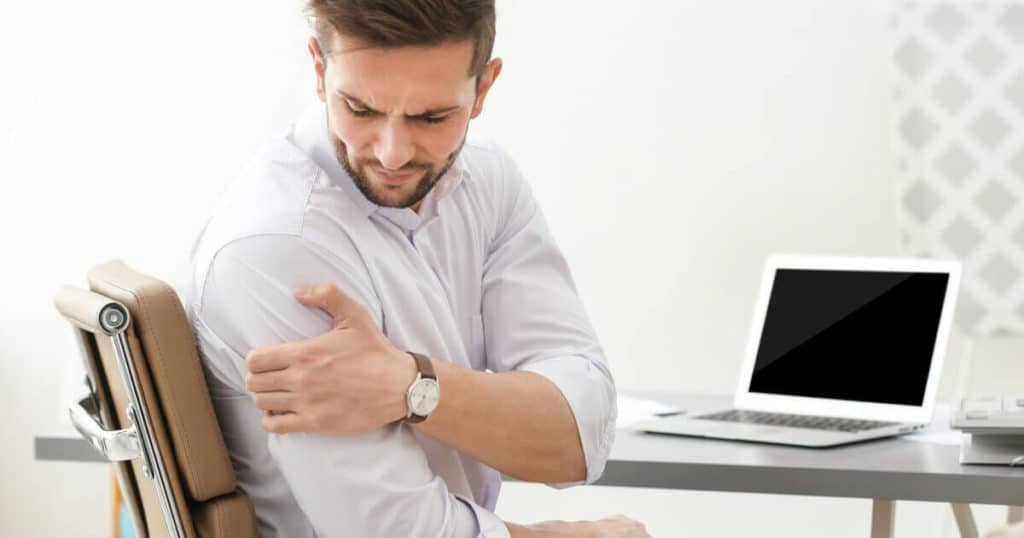 man with shoulder pain