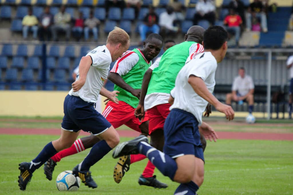 Football players fight for the ball