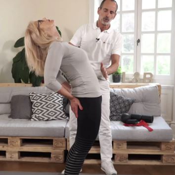 A woman bending backwards during an exercise
