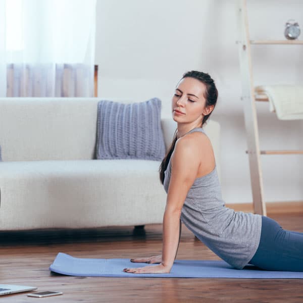Woman does Stretching exercise for pain