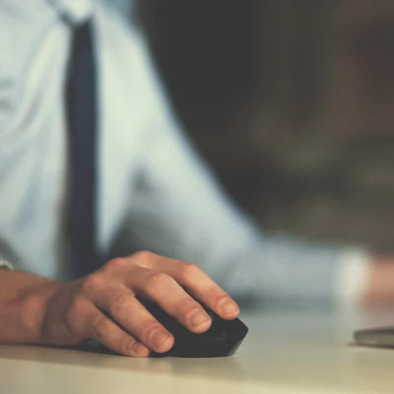 A hand using a mouse.