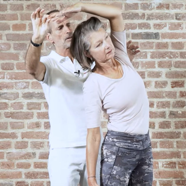 A woman demonstrates bulging disc exercise 2.