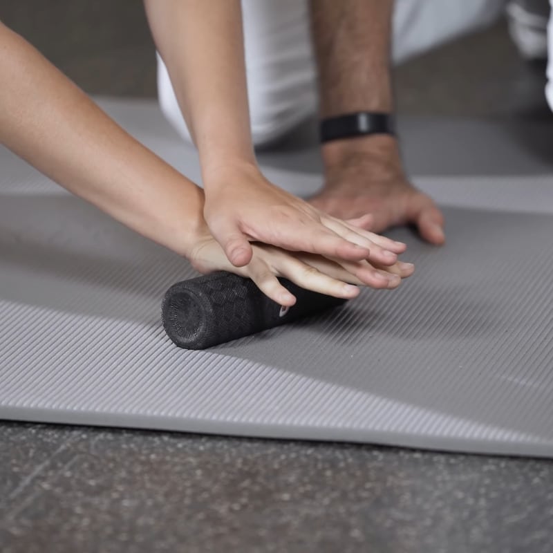 This is a picture of someone foam rolling their trigger finger.